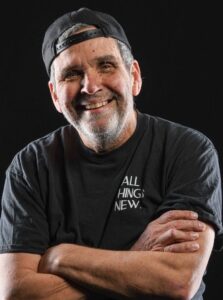 Brian Patafie Canadian comedian and former NHL athletic trainer performing on stage