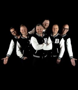 The Bromantics performing live — Saskatchewan six-piece band blending classic rock, doo-wop, Motown, and modern pop.